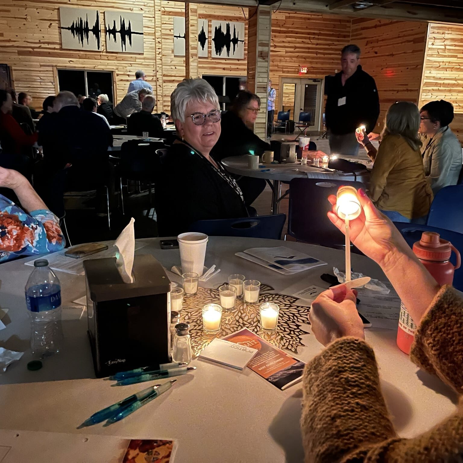 Conference Members Lighting Candles